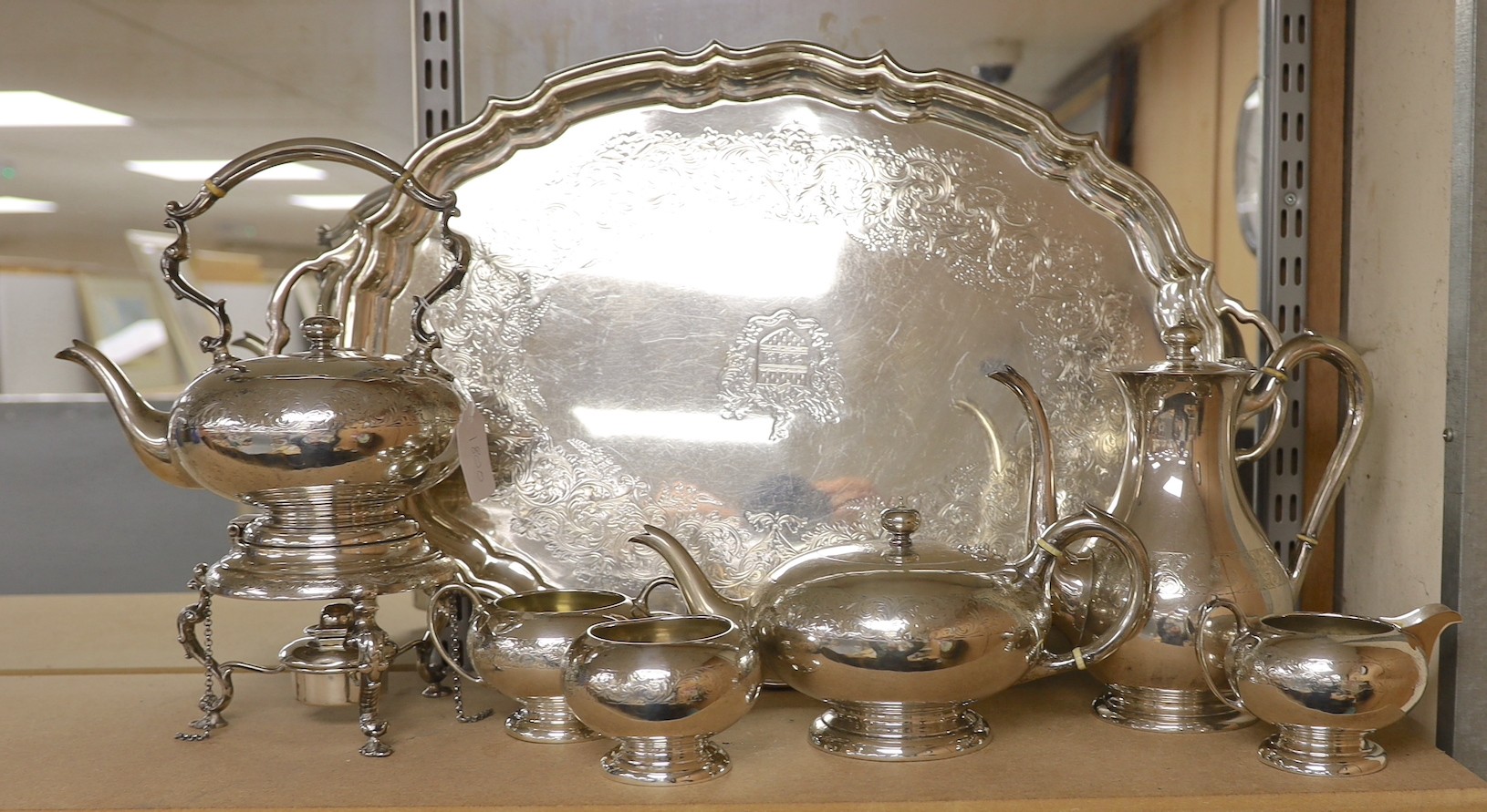 A 20th century Canadian Birks sterling seven piece tea and coffee service, comprising a tea tray, kettle on stand with burner, teapot, coffee pot, two sugar bowls and a cream jug, tea tray 64.7cm over handles